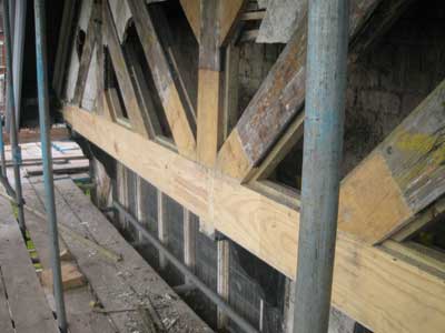 Multiple Timber Resin Splice repairs to a roof truss.