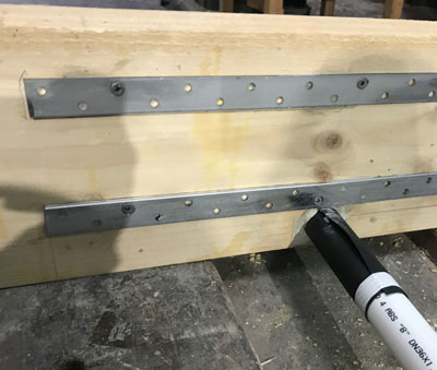 Pipe wrapped and taped for joist slot repair